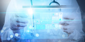Smart medical doctor working with stethoscope and digital tablet computer.Health care and medical online services concept with virtual innovation medical dashboard.