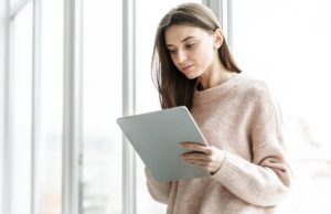 portrait young businesswoman with tablet
